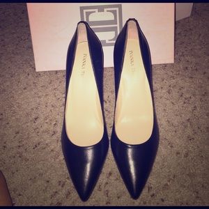 Ivanka Black chunky heel w/snake skinned heel.